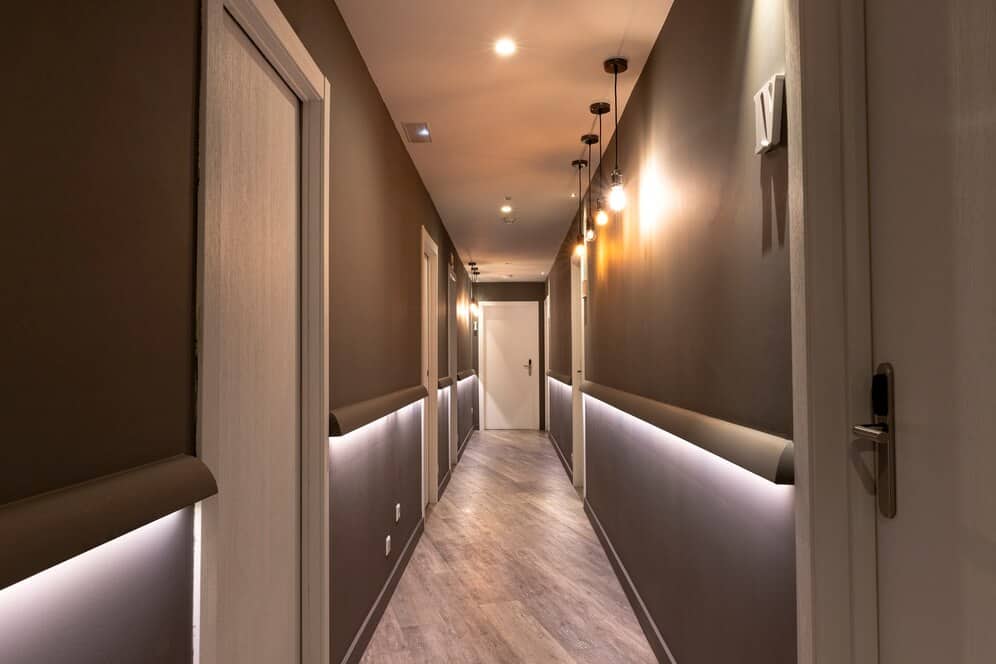 Landscape lighting illuminating a modern outdoor walkway