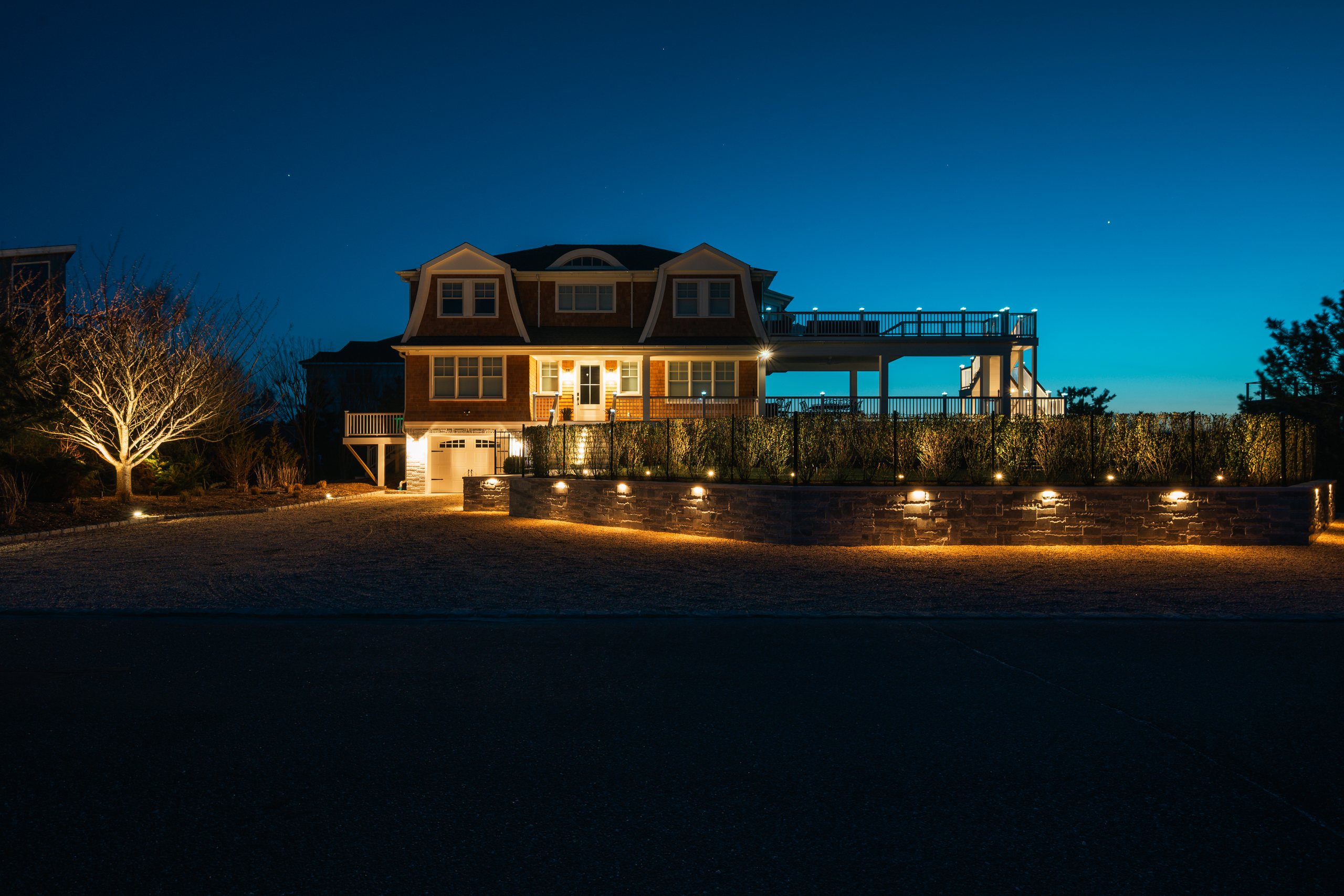 Architectural outdoor lighting on a Long Island coastal home