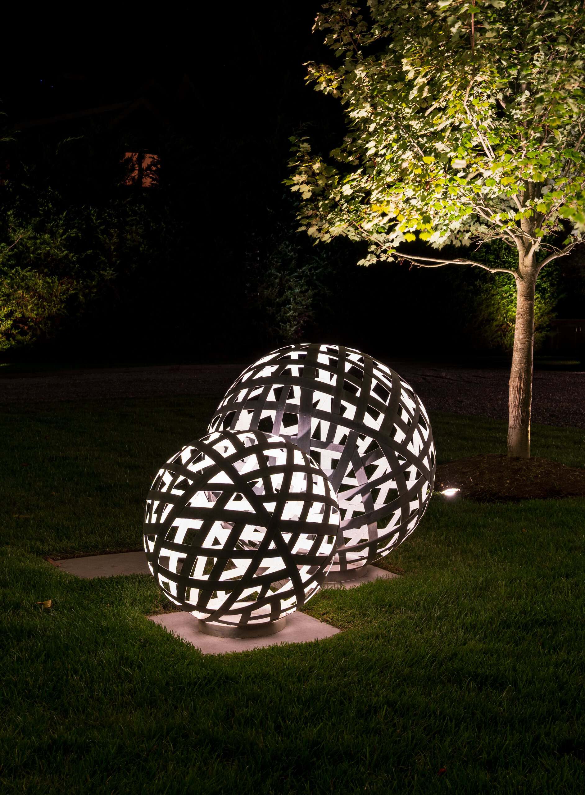 Garden sculpture lighting with tree uplighting on Long Island